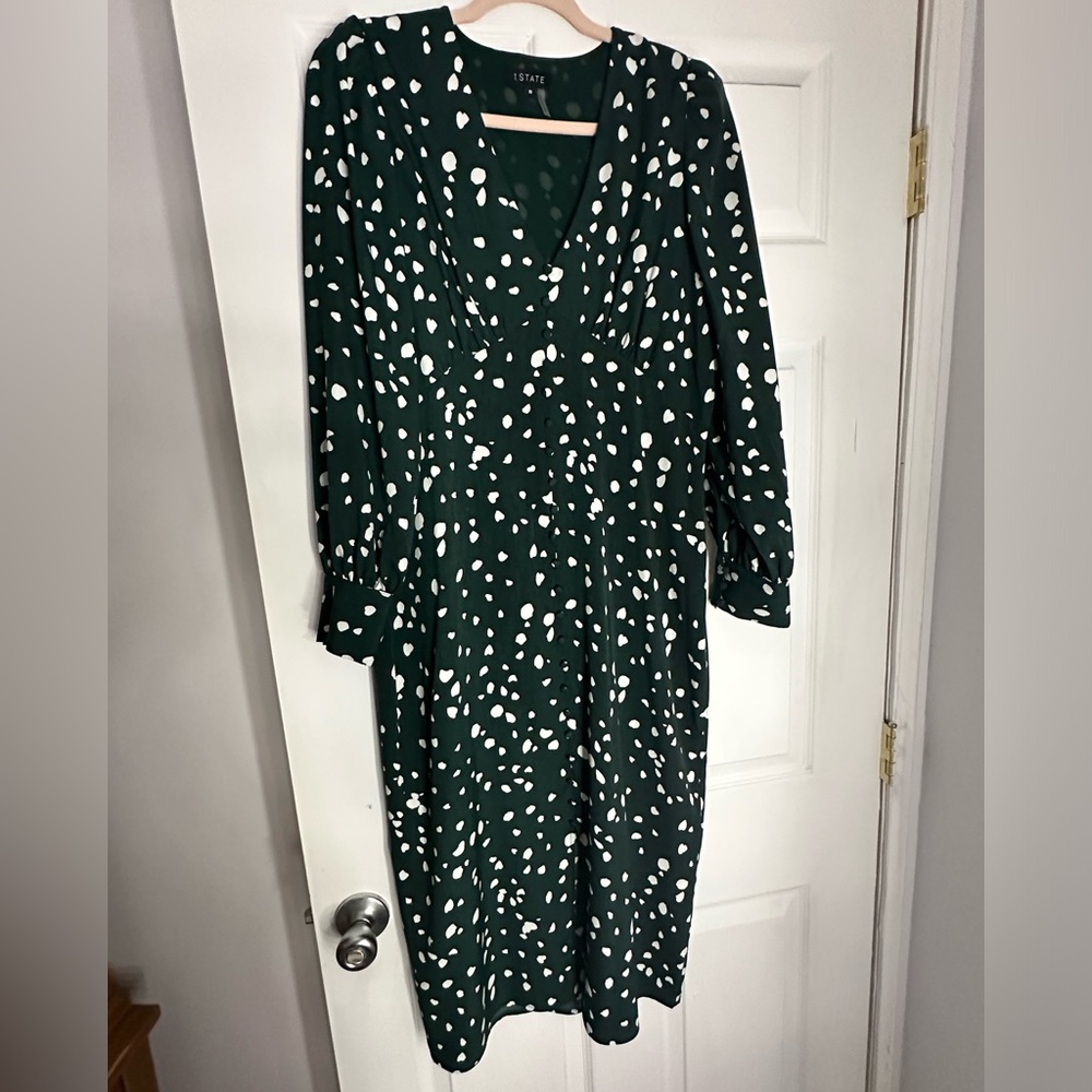 1 state dark green dress with white polka dots .. looks brand new